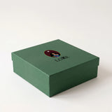 Lore Mehfil Diwali gift box in Mehendi Green with illustrated Lore logo
